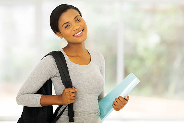 happy afro american university student looking at the camera